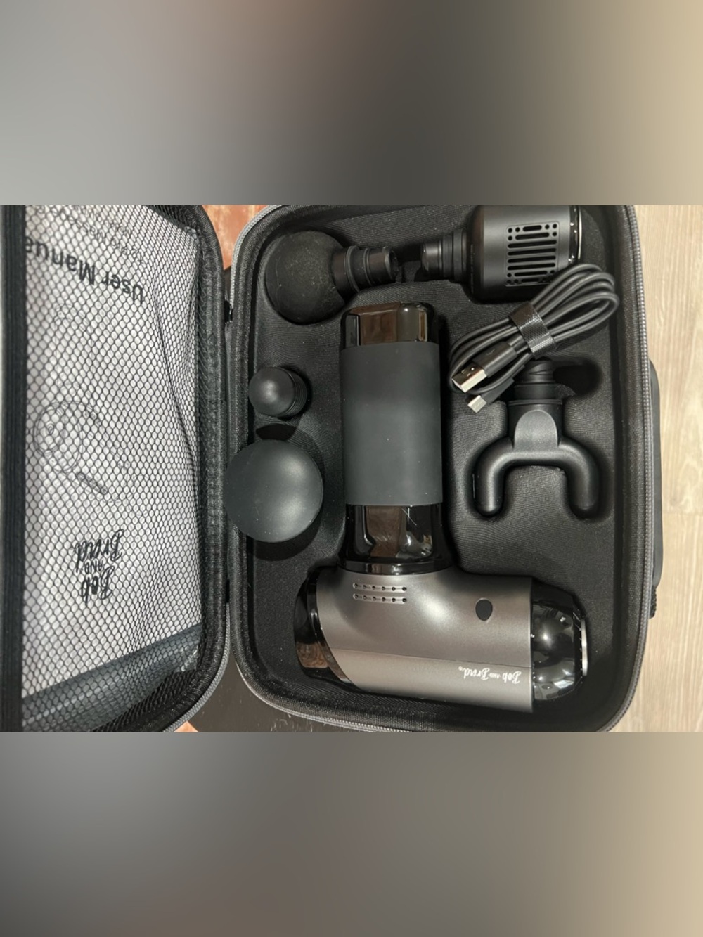 Portable Massage Gun with Multiple Heads - Black and Gunmetal